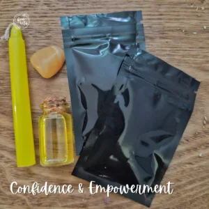 Confidence & Empowerment Spell Kit with yellow candle, carnelian, herbs, oil and scroll to support courage and self-belief.