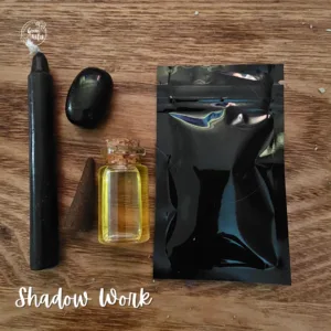Shadow Work Spell Kit with black candle, herbs, crystal, and scroll for spiritual healing and inner truth.