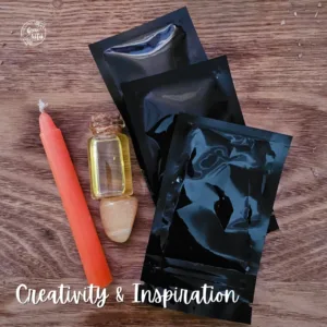 Creativity & Inspiration Spell Kit with orange candle, sunstone, herbs and scroll to boost imagination and creative energy.