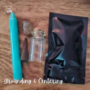 Grounding Spell Kit with green candle, smoky quartz, earth, oil and scroll for balance and emotional calm.